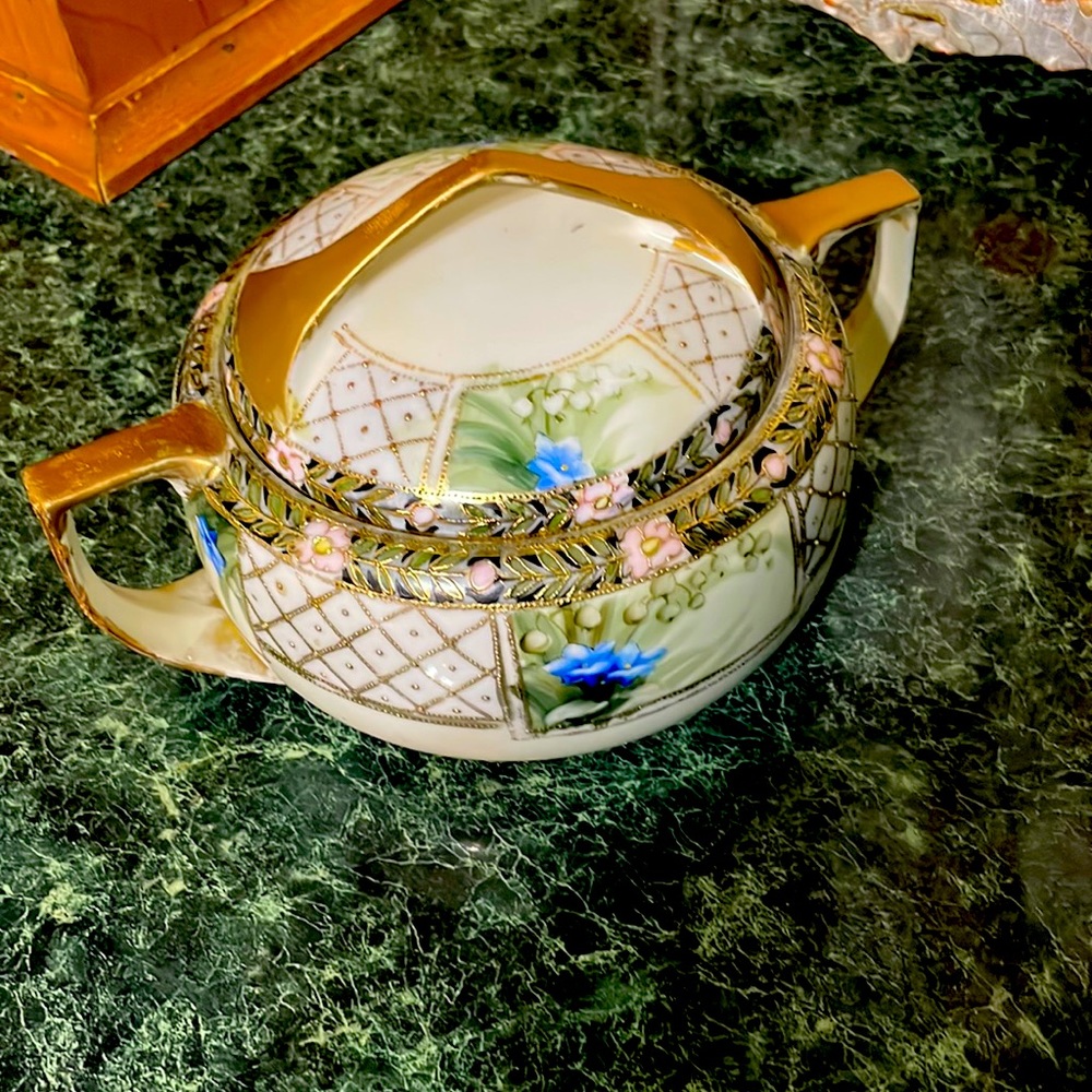 Hand painted beautiful 2 piece teapot.  Very gently used